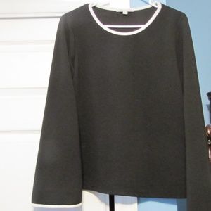 Black top with white piping